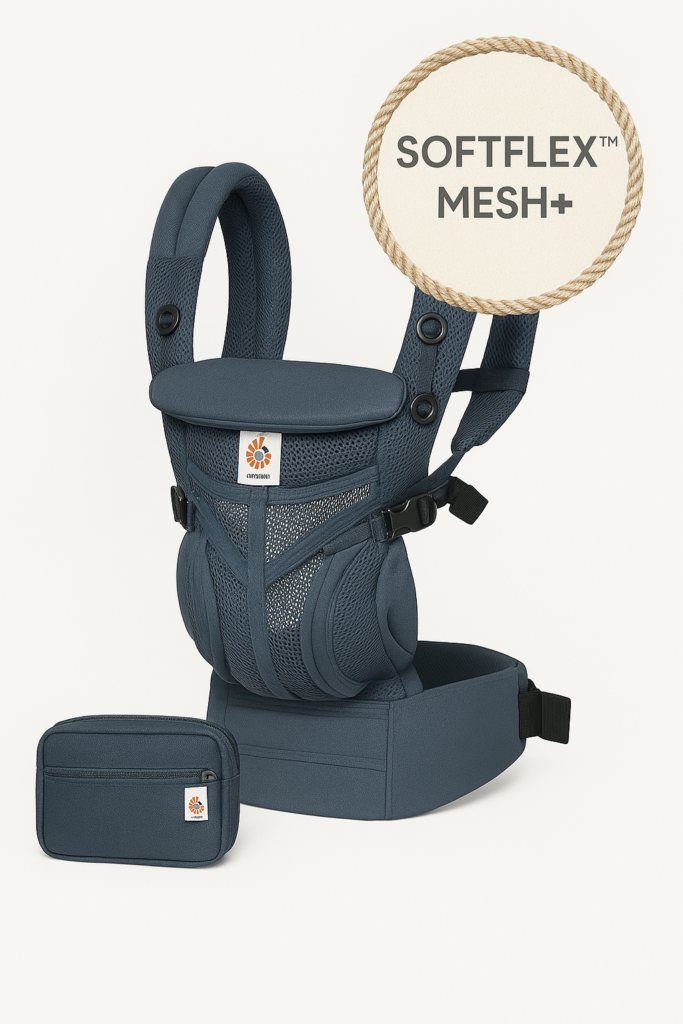 A navy blue baby carrier made from SoftFlex™ Mesh fabric, featuring adjustable ergonomic straps, a waist belt, and a detachable storage pouch. A circular label reading "SOFTFLEX™ MESH+" is positioned above the carrier.