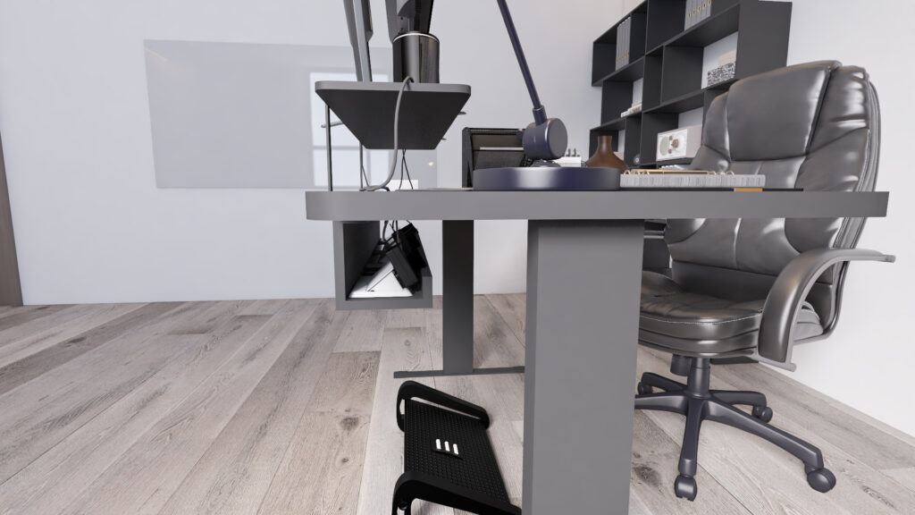 Technik und Interior im Einklang – modernes Büro mit grauem Schreibtisch, ergonomischem Stuhl und integrierter Kabelführung für einen aufgeräumten Arbeitsplatz.